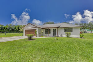 16141 Harlena Dr E in Loxahatchee, FL - Building Photo