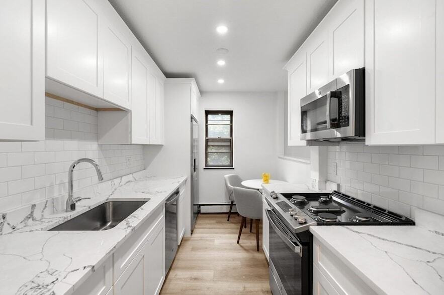 4925 Washington St, Unit 306 in Boston, MA - Building Photo