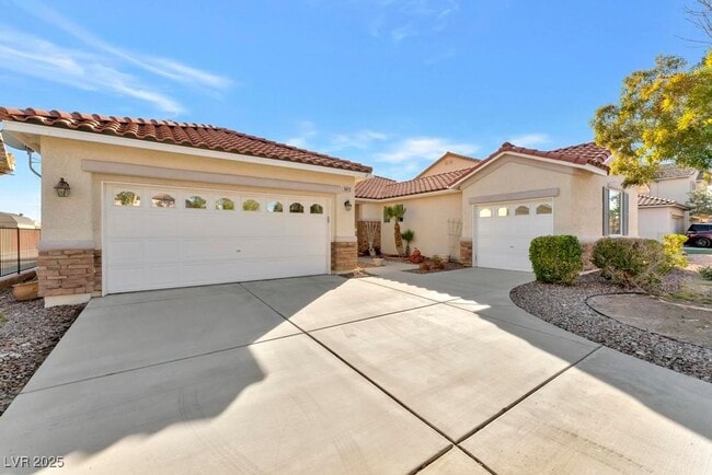 property at 5873 Wildhorse Ledge Ave