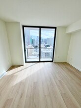 141 NE 2nd St, Unit 900 in Miami, FL - Building Photo - Building Photo