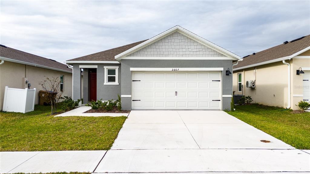 2667 Swooping Sparrow Dr in St. Cloud, FL - Building Photo