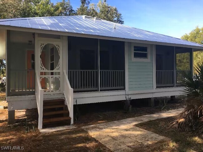 4404 Lake Heather Cir in Saint James City, FL - Building Photo - Building Photo