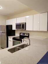 1721 Whitehall Dr-Unit -402 in Davie, FL - Building Photo - Building Photo