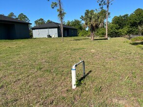 1221 Ecstasy St E in Lehigh Acres, FL - Building Photo - Building Photo