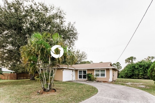 1702 SW Boeing St in Port St. Lucie, FL - Building Photo - Building Photo