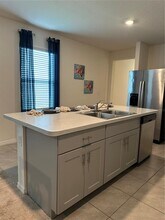 1989 Egret Meadows Ave in Kissimmee, FL - Foto de edificio - Building Photo