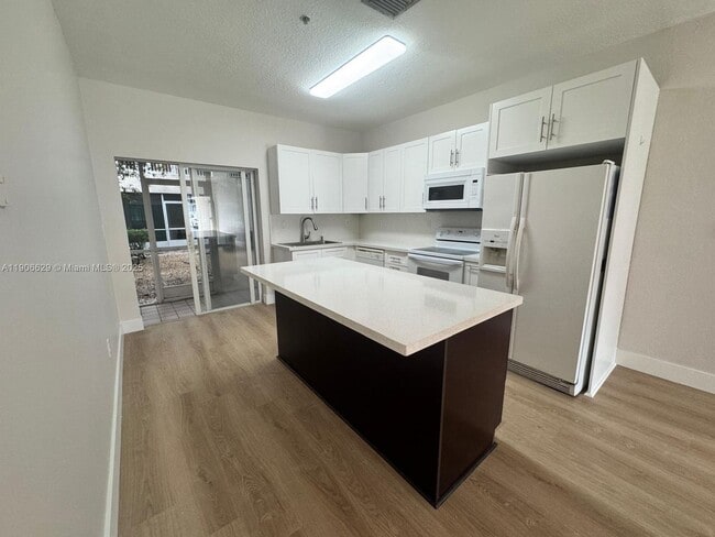 property at 5630 NW 114th Path