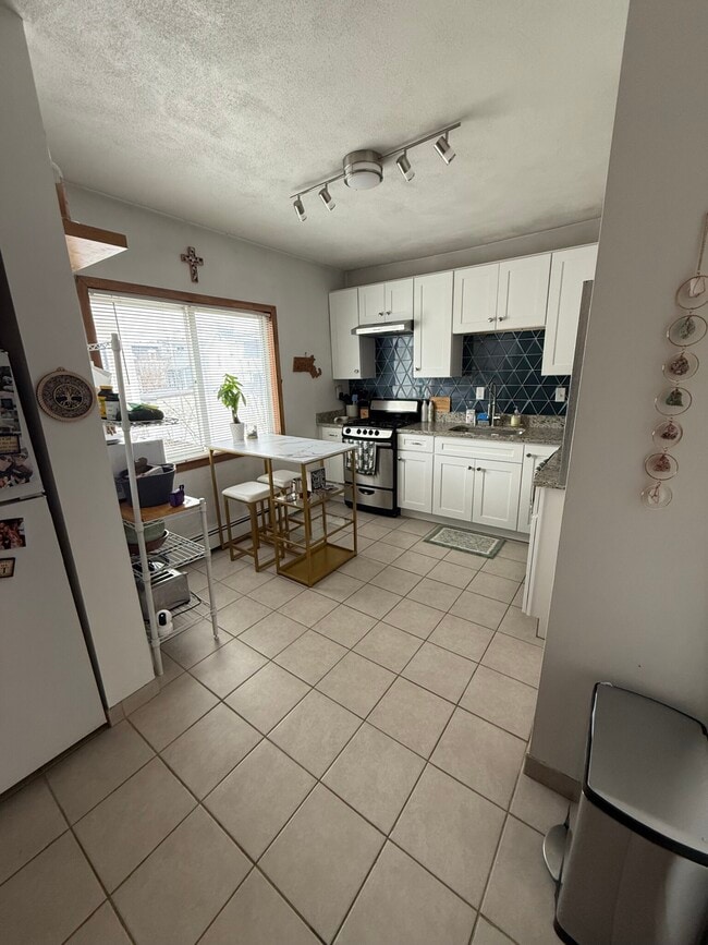 property at 585 Somerville Ave