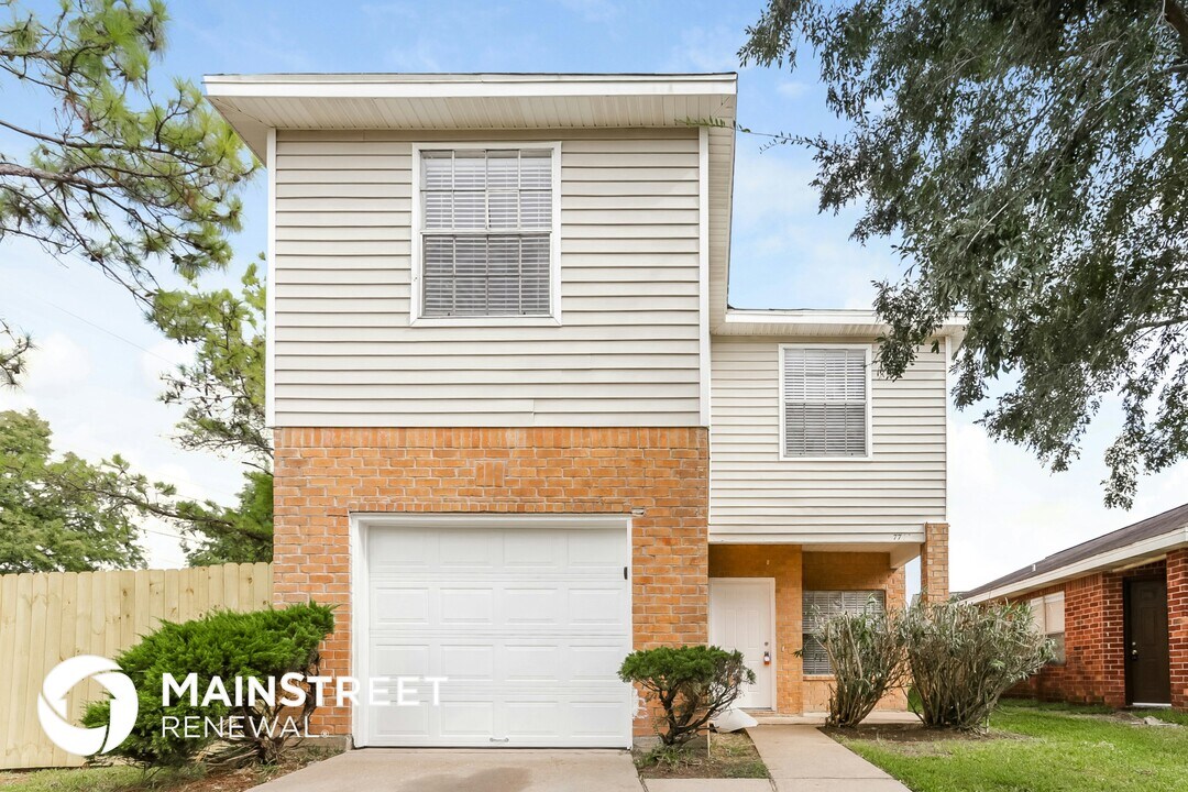 7744 Ellis Dr in Missouri City, TX - Foto de edificio