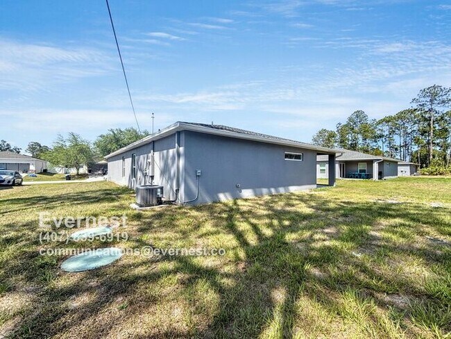 734 Micco St SW in Palm Bay, FL - Foto de edificio - Building Photo