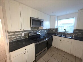 1344 Wickham Ln in Holiday, FL - Building Photo - Building Photo