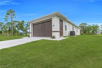 708 Poinsettia Ave in Lehigh Acres, FL - Building Photo - Building Photo