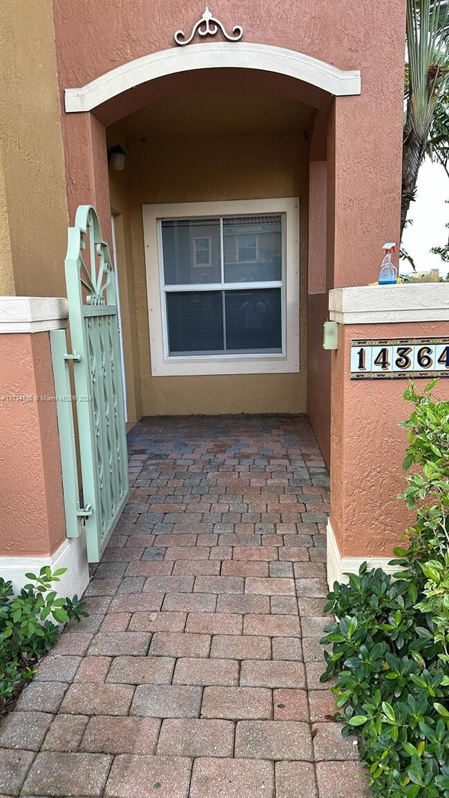 property at 14364 SW 11th St