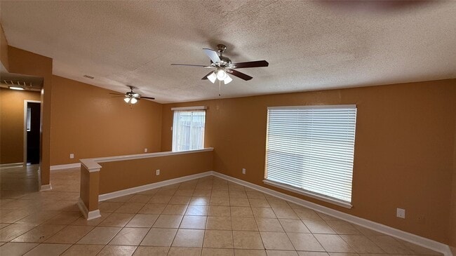 property at 12024 Tambourine Dr