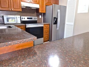 8811 SW 132nd Pl, Unit 203CW in Miami, FL - Foto de edificio - Building Photo