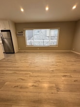 7555 De Longpre Ave in Los Angeles, CA - Building Photo - Building Photo