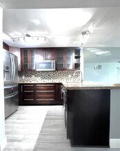 2311 S Cypress Bend Dr in Pompano Beach, FL - Building Photo - Building Photo