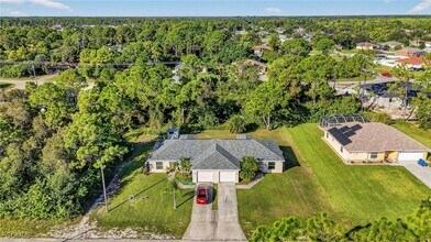 710 Creuset Ave S in Lehigh Acres, FL - Building Photo - Building Photo