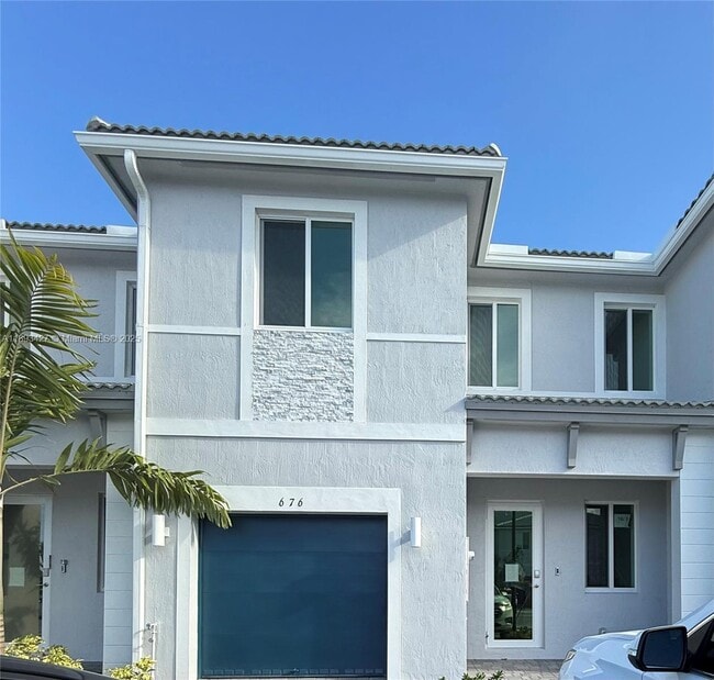 property at 676 SE 14th St