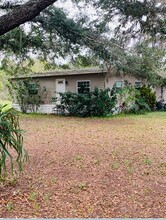 5682 Mount Olive Rd in Polk City, FL - Building Photo - Building Photo