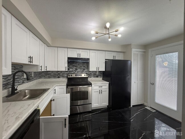 property at 14 James Cubberly Ct