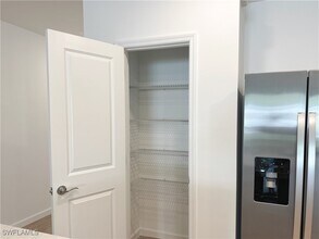 27831 Solis Grande Dr in Bonita Springs, FL - Building Photo - Building Photo