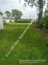 1909 McPhail St in Flint, MI - Building Photo - Building Photo