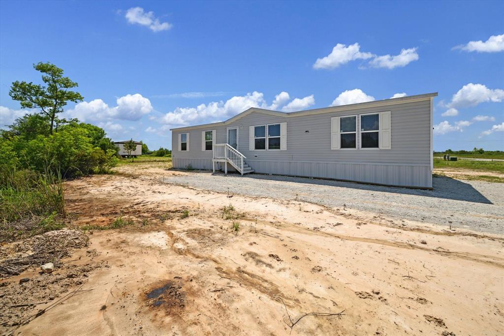 1264 Rd 5735 in Cleveland, TX - Building Photo