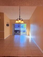 1040 Lake Shore Dr in Lake Park, FL - Building Photo - Building Photo