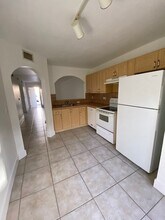 2910 SE 13th Rd, Unit 103 in Homestead, FL - Building Photo - Building Photo