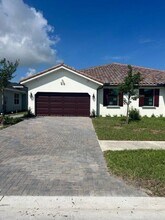 1231 Tangled Orch Trce in Loxahatchee, FL - Building Photo - Building Photo
