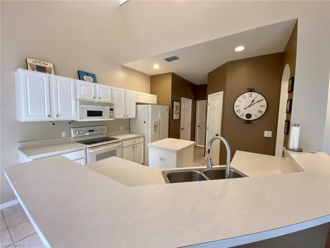 74 Burnt Pine Dr, Unit 4001 in Naples, FL - Building Photo - Building Photo