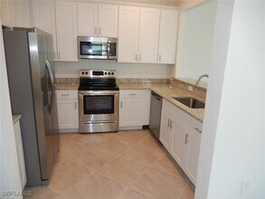 14205 Pine Lodge Ln in Miromar Lakes, FL - Building Photo - Building Photo