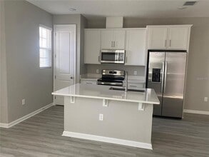 1457 Axel Graeson Ave in Kissimmee, FL - Building Photo - Building Photo