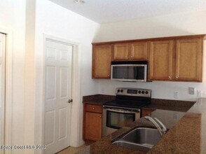 131 Majestic Bay Ave in Cape Canaveral, FL - Building Photo - Building Photo