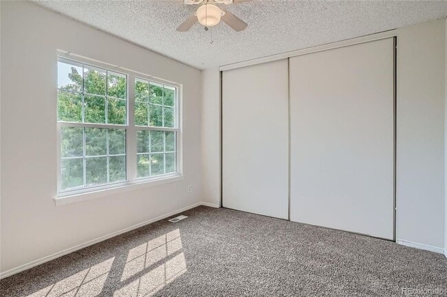 10569 W Dartmouth Ave in Lakewood, CO - Building Photo - Building Photo
