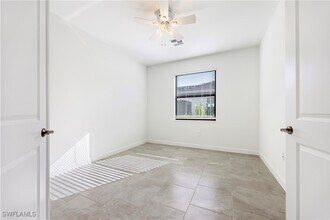 19597 Hinkley Dr in Estero, FL - Building Photo - Building Photo