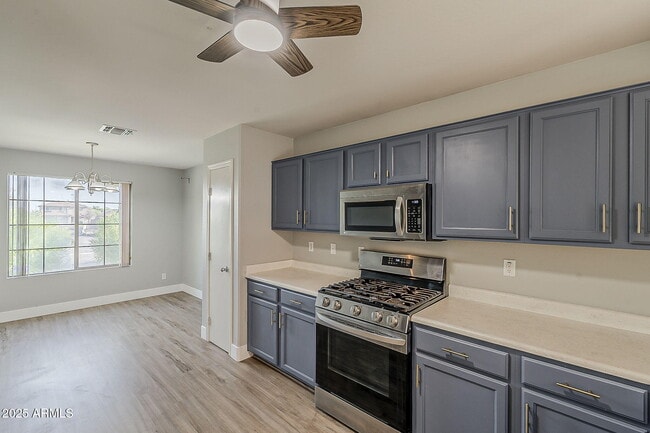 13930 W Country Gables Dr in Surprise, AZ - Building Photo - Building Photo