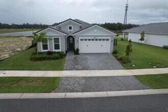 14075 Spruce Pne Dr in Westlake, FL - Building Photo - Building Photo