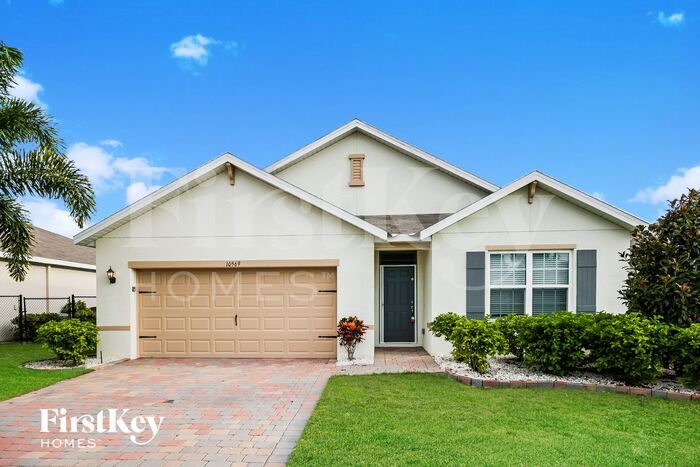 10569 Canal Brook Ln in Lehigh Acres, FL - Foto de edificio