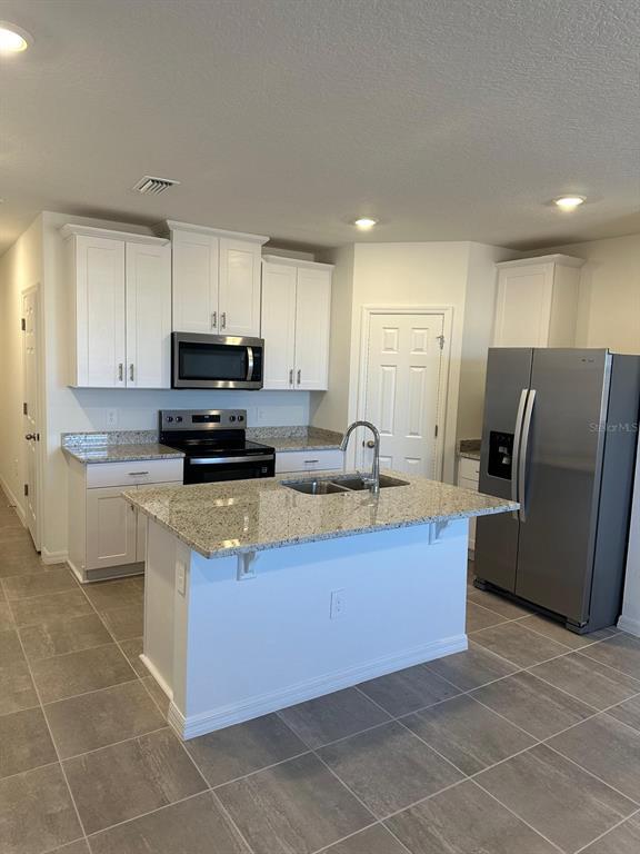 16446 Bird of Paradise Ave in Clermont, FL - Building Photo - Building Photo