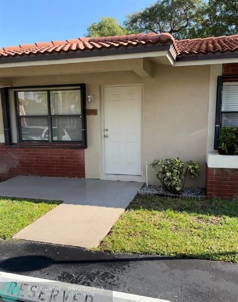property at 9609 NW 4th St