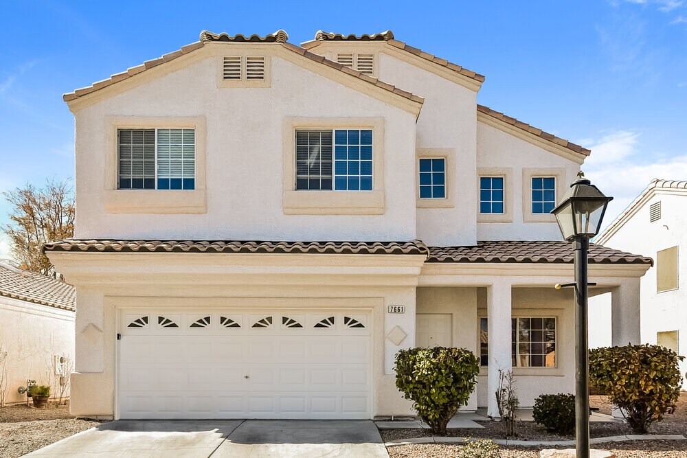 7661 Rainbow Cove Dr in Las Vegas, NV - Building Photo