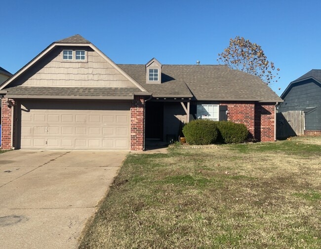 property at 20401 E 43rd St S