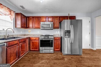 1903 Cobblestone Ct in Conyers, GA - Foto de edificio - Building Photo