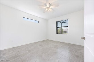 19597 Hinkley Dr in Estero, FL - Building Photo - Building Photo