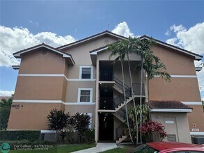 9033 Wiles Rd in Coral Springs, FL - Building Photo - Building Photo