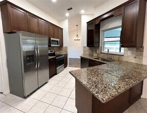 1520 Coastal Pl in Dunedin, FL - Building Photo - Building Photo