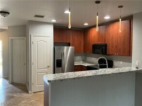 8667 Athena Ct in Lehigh Acres, FL - Building Photo - Building Photo