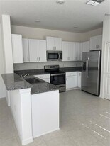 32077 Powderpuff Mimosa Dr in San Antonio, FL - Building Photo